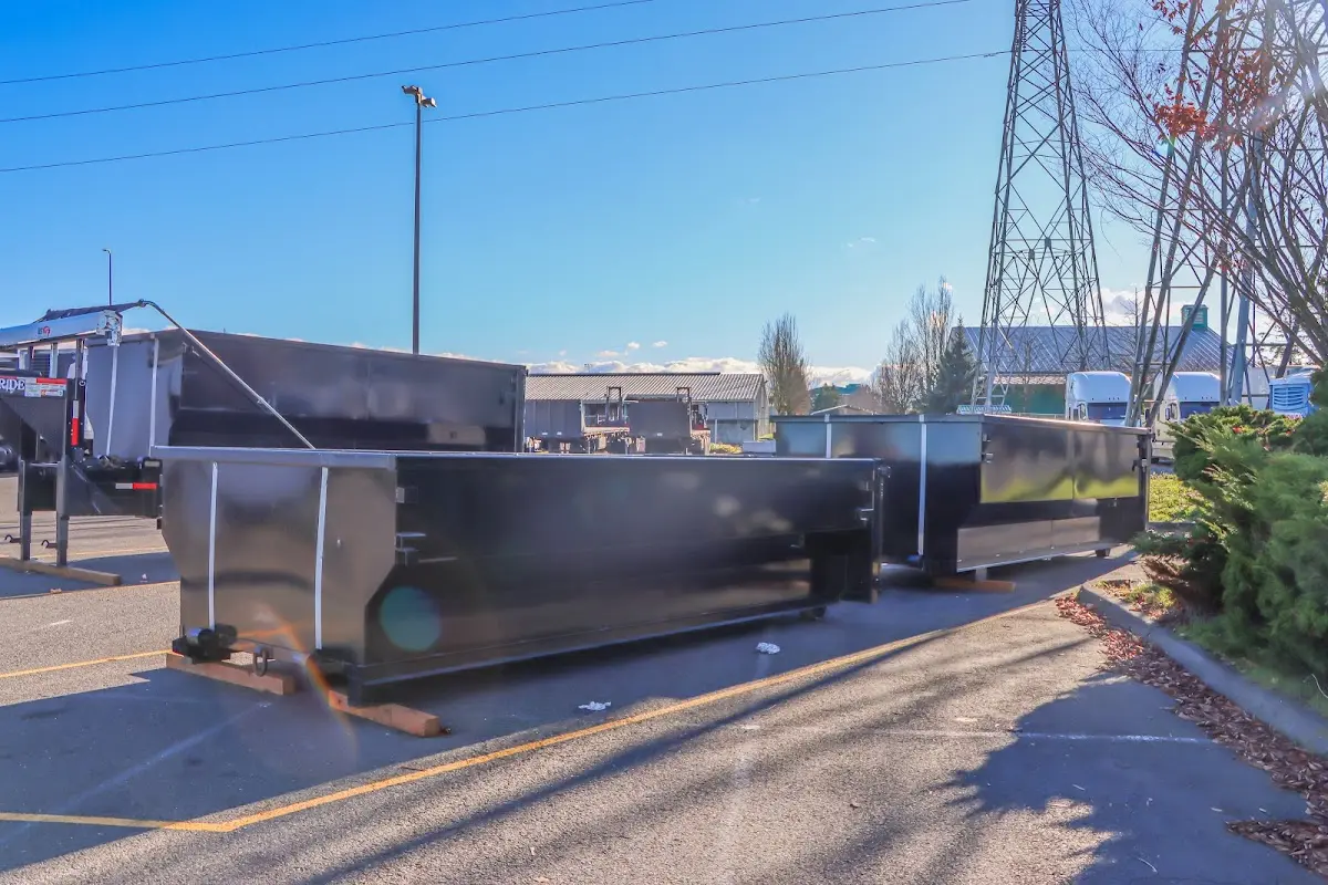 Roll-off dumpster ready for waste disposal at job site for Construction Dumpster Rental in Center Line